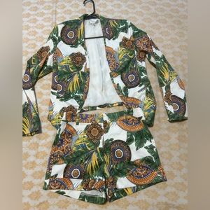 2piece of set of this cute blazer top and botton short are small sizes.